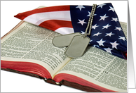 military dog tags on Holy Bible with flag for Veterans Day card