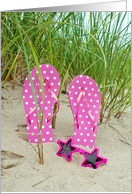 white polka dot on pink flip flops and star sunglasses in sand card
