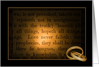 gold wedding rings on Bible verse with dark vignetting card