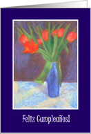 Spanish Language Birthday with Scarlet Tulips Blank Inside card