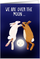 Engagement announcement, two rabbits over the moon. card