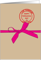 Paralegal Day, illustration of pink ribbon tied round brown folder card